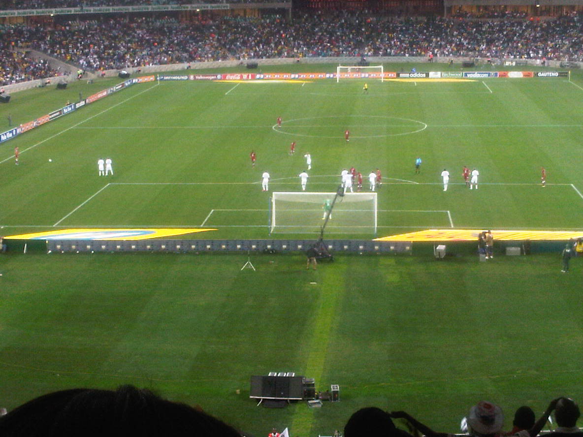 Orlando Pirates players and staff celebrating after the 2010 MTN8 final victory
