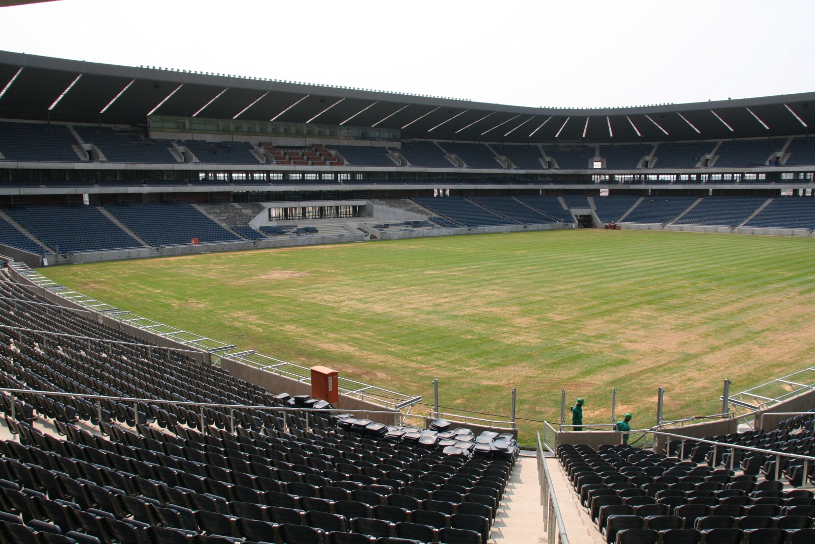 Inside Orlando Amstel Arena, the stands filling with Orlando Pirates supporters on matchday